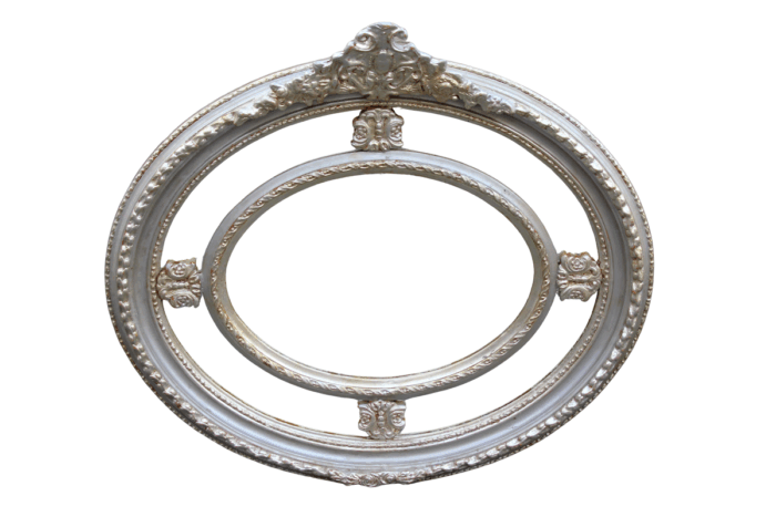 Ornate oval silver gilded mirror with crown