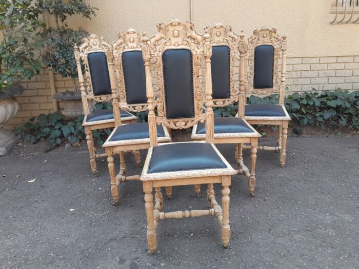 A 19th Century French Set of Six Ornately Carved Oak Chairs in a Contemporary Bleached Finish and Upholstered in Leather - Image 2
