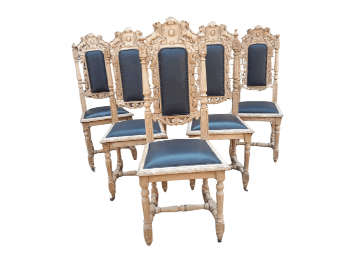 A 19th Century French Set of Six Ornately Carved Oak Chairs in a Contemporary Bleached Finish and Upholstered in Leather