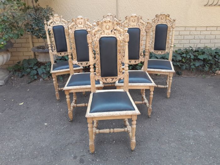 A 19th Century French Set of Six Ornately Carved Oak Chairs in a Contemporary Bleached Finish and Upholstered in Leather - Image 3