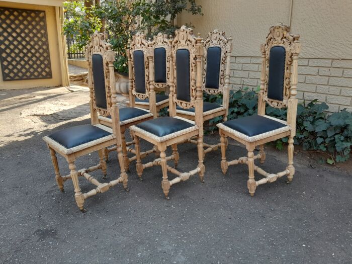 A 19th Century French Set of Six Ornately Carved Oak Chairs in a Contemporary Bleached Finish and Upholstered in Leather - Image 5