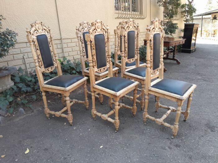 A 19th Century French Set of Six Ornately Carved Oak Chairs in a Contemporary Bleached Finish and Upholstered in Leather - Image 6