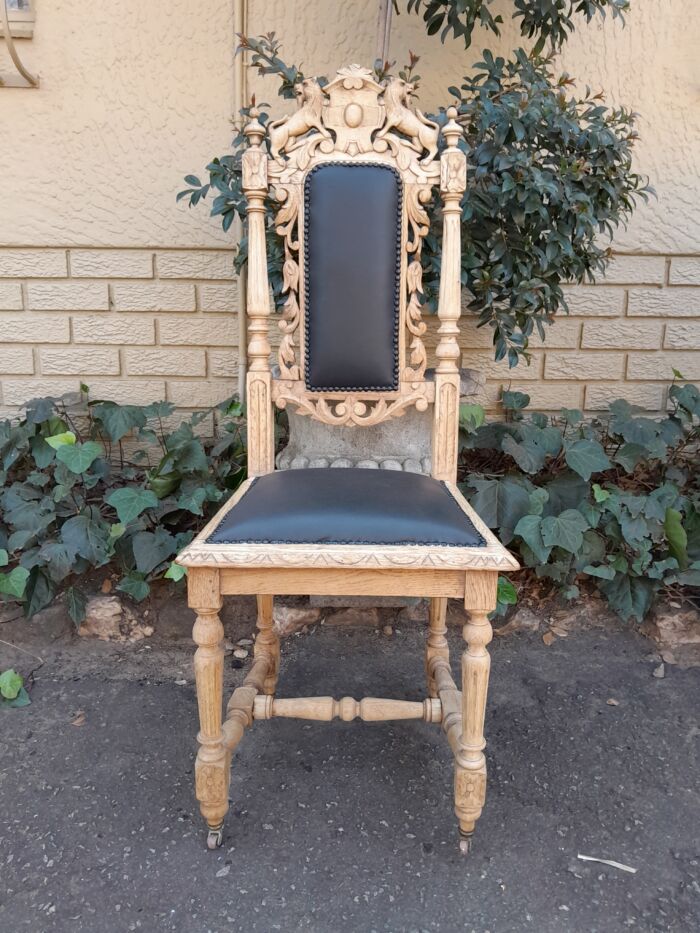 A 19th Century French Set of Six Ornately Carved Oak Chairs in a Contemporary Bleached Finish and Upholstered in Leather - Image 7