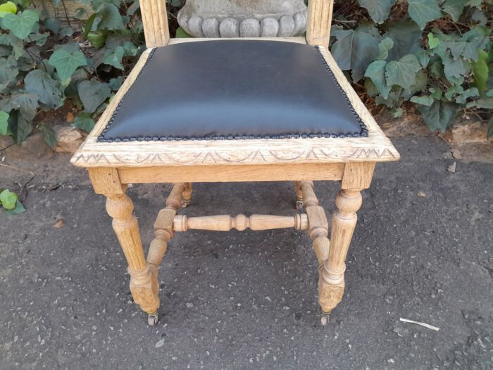 A 19th Century French Set of Six Ornately Carved Oak Chairs in a Contemporary Bleached Finish and Upholstered in Leather - Image 10