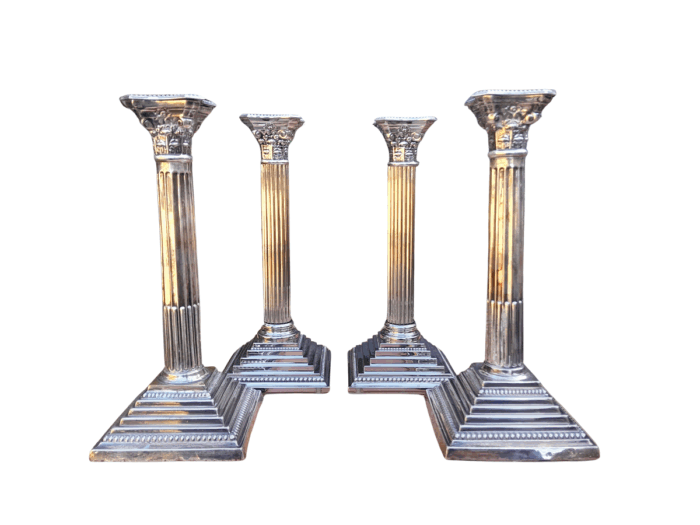 A Set of Four 20th Century Elizabeth II Silver-Plated Corinthian Column Candlesticks