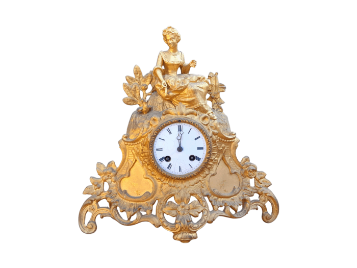 A 19th Century French Gilt Spelter Clock with Pendulum and Key