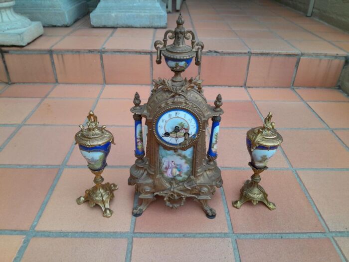 A 19th Century French Garniture Set With Gilt Bonze Clock With Key  And Pair Of Gilt Metal Porcelain Garniture On Velvet Bases - Image 3