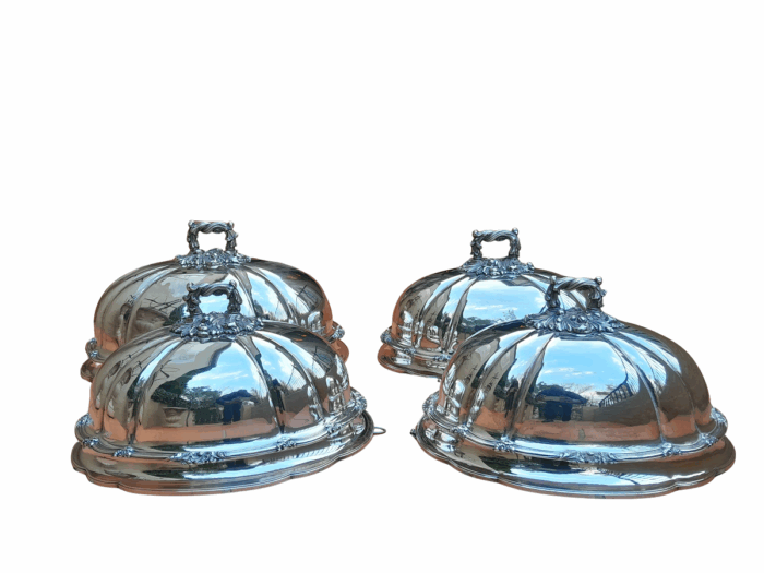 An Antique Victorian Set of Four Silver Plated Graduated Food Domes