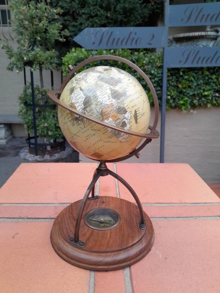 A 20th Century Library Rotating Globe with Brass Mounts and on Wooden Base with Compass - Image 2