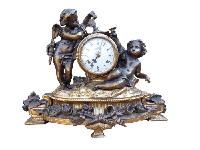 A French Louis XVI Bronze And Gilt Clock