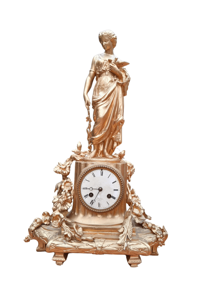 An Antique French Louis XVI Figural Clock with Pendulum and Key