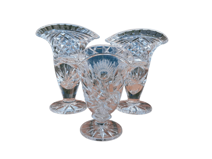 A Set of Three Cut Glass Vases
