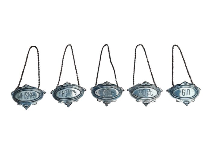 A Mid 20th Century Set of Five Sterling Silver Decanter Labels Brandy Port Sherry Gin Whisky  Weight 70grams