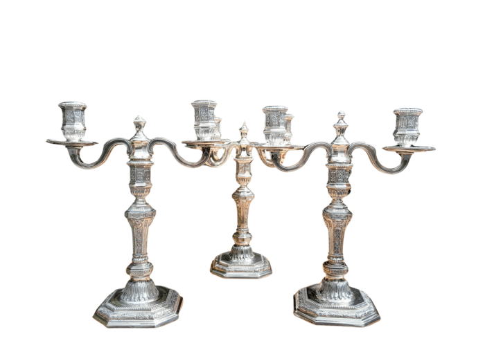 A Set Of Three Christofle Silver Plate Candelabras Comprising A Pair Of Two Arm Candelabras And A Single Four Arm Candelabra