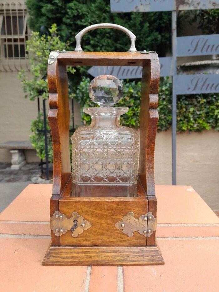 An Antique Victorian Tantalus With A Crystal Decanter And Key - Image 2