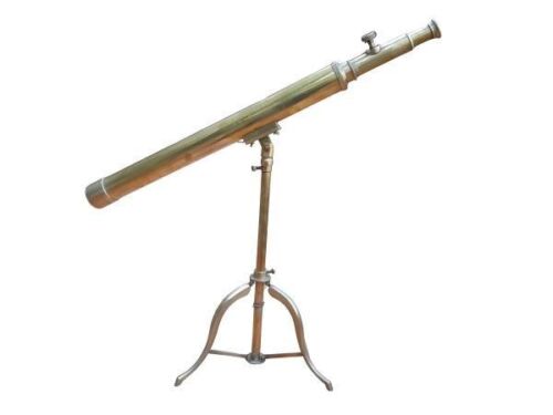 An Antique Brass Table Top Telescope On Tripod Base