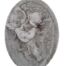 A Concrete Relief Oval Sculpture Of An Ornate Cherub Plaque