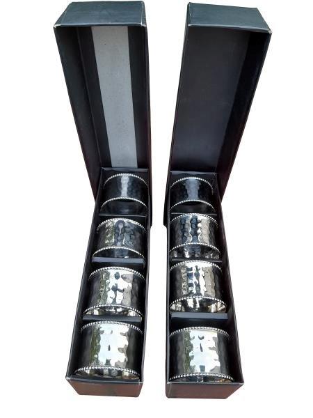 A Set Of Eight Electroplate Napkin Rings