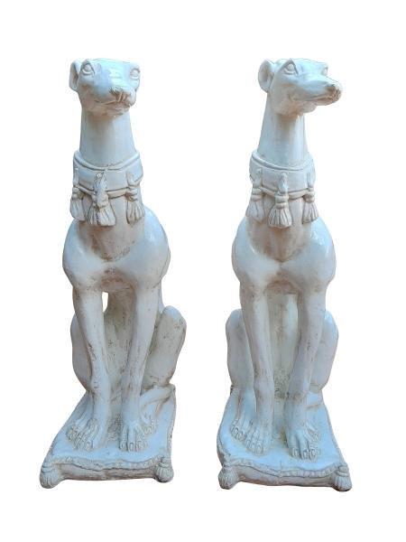 A 20th Century Pair Of Decorative Glazed Cast Stone Whippets Sitting On Cushions