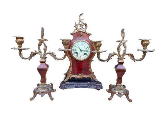 An Antique French Rococo-Style Ormolu And Tortoiseshell Garniture Set Of Clock And Pair Candelabras