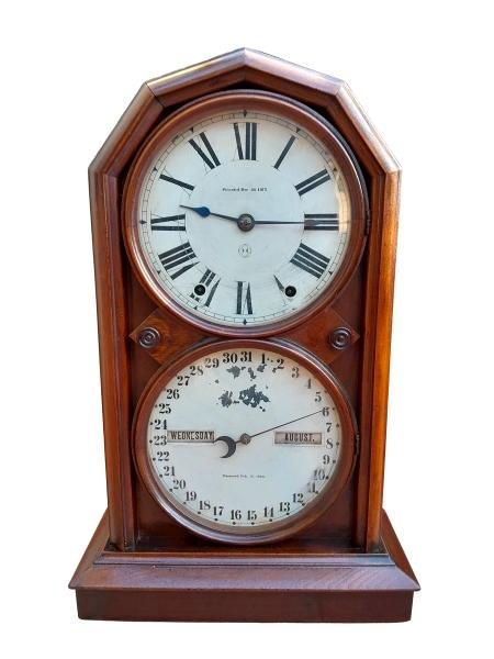 A 19th Century Mahogany Calendar Clock With Pendulum
