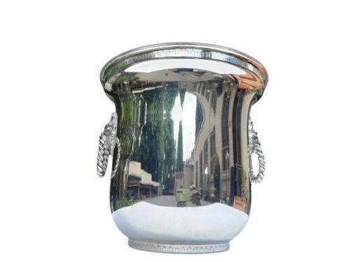 A Silver-Plated Ice Bucket With Lion Mask