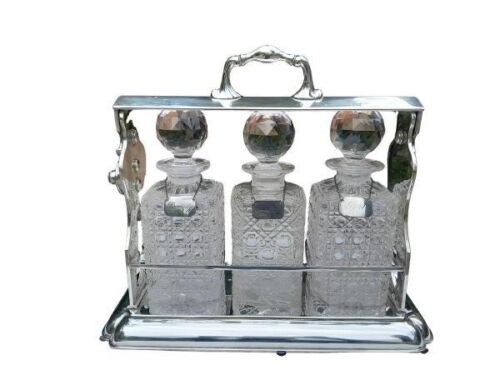 An 20th Century EPNS Tantalus With Hallmarked Wine Labels