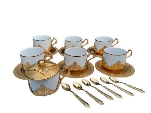 A 20th Century Set Of Six Italian  Monopoli Porcelain Tea Cups And Saucers With Gilt Metal Holders And Six Gold Teaspoons And Sugar Cup With Lid