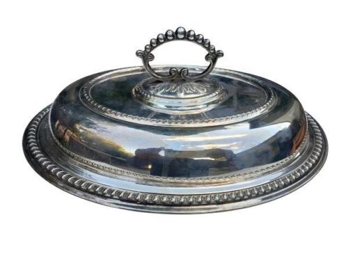 A 20th Century Entrée Dish With Handle