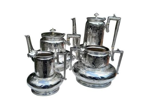 An Antique Victorian Silver Plate Four Piece Tea Set Comprising A Coffee Pot