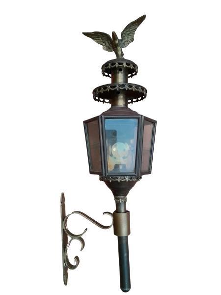 An Antique Victorian Brass Carriage Lantern Topped With Eagle