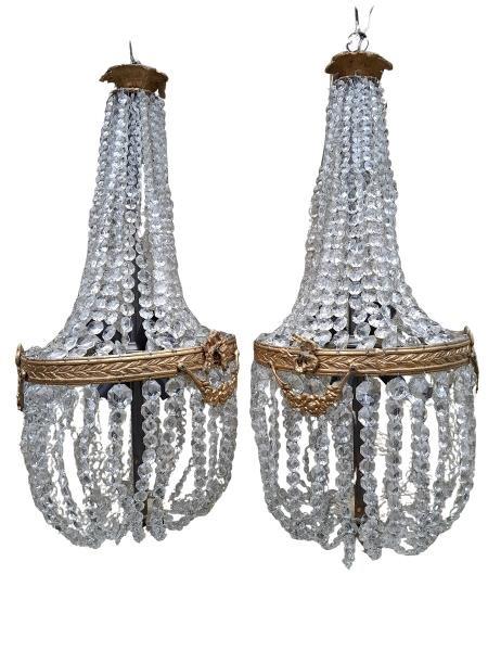 A 20th Century Pair Of French Empire Style Brass & Crystal Chandeliers
