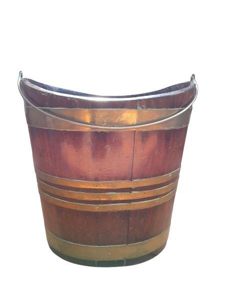 A 20th Century English Mahogany and Brass Bucket with Handle