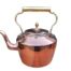 A Copper Kettle with Brass handle