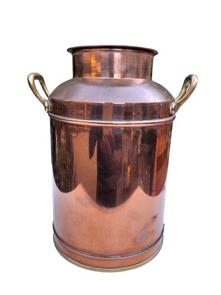 A 20TH Century Brass And Copper Milk Can