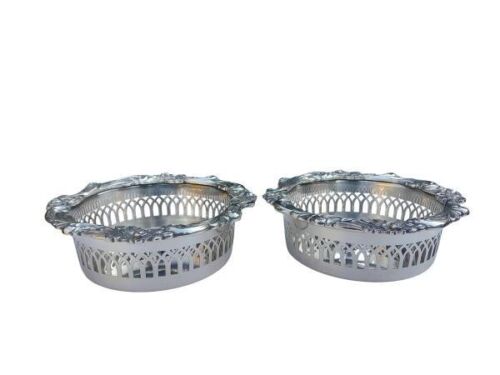 A 20th Century Pair Of Electroplate Wine Coasters