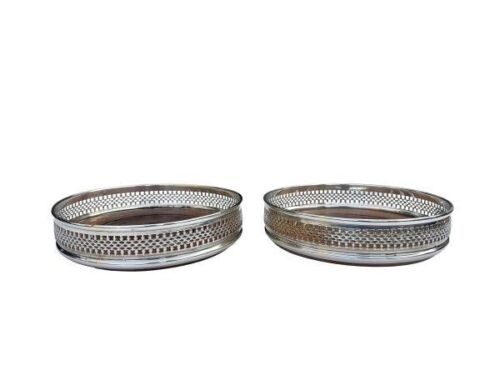 A  20th Pair Of English Stamped Silver Plated Wine Coasters