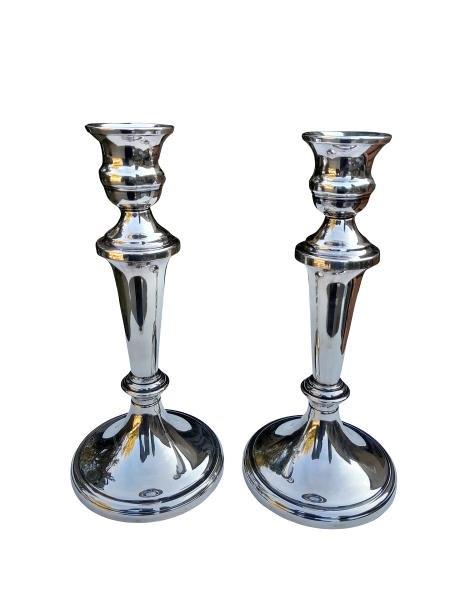A Pair Of Silver Plated Candlesticks With Sconces