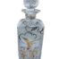 A Cut Crystal Decanter With Gilt And Silver Duck