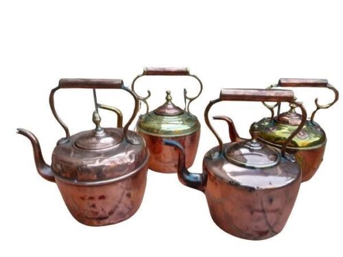 A 20th Century Set Of Four Copper Kettles With Brass