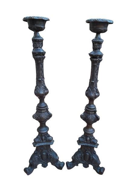 A 20TH Century Tall Pair Of Bronze Patinated Candlesticks