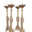 A Set Of Four Tall Renaissance Revival Brass Painted Alter Candle Sticks