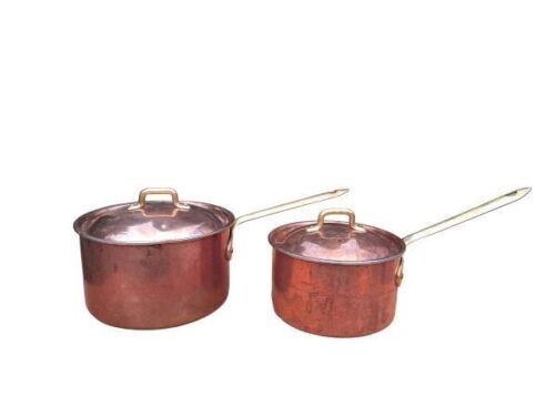A 20th Century Set of Two Copper Saucepans with Brass Handles and Lids