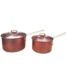 A 20th Century Set of Two Copper Saucepans with Brass Handles and Lids
