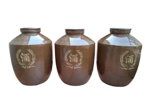 A 20th Century Chinese Set Of Three Large Glazed Earthenware Wine Jars