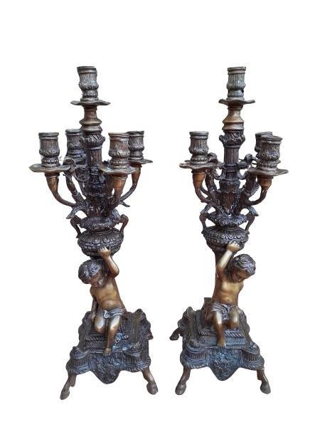 A 20th Century Pair Of French Rococo Style Bronze And Patinated Candelabras With Putti