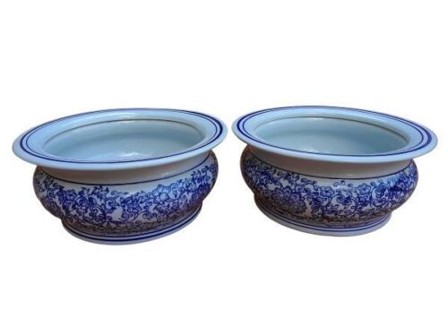 A Pair Of Blue / White Ceramic Planters