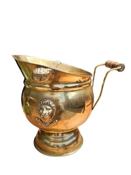 A 20th Century Brass Coal Scuttle In A Helmet Shape With Wooden Hand