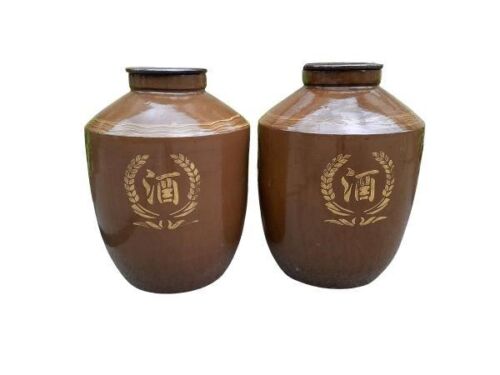 A 20th Century Pair Of Large Chinese Glazed Pottery Wine Jars