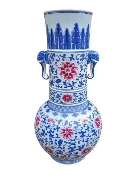 A Chinese Ceramic Vase With Elephant Lugs